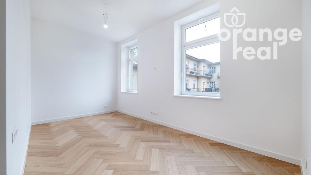 Priestranný 2-izbový byt v historickej budove s balkónom na Moyzesovej ulici