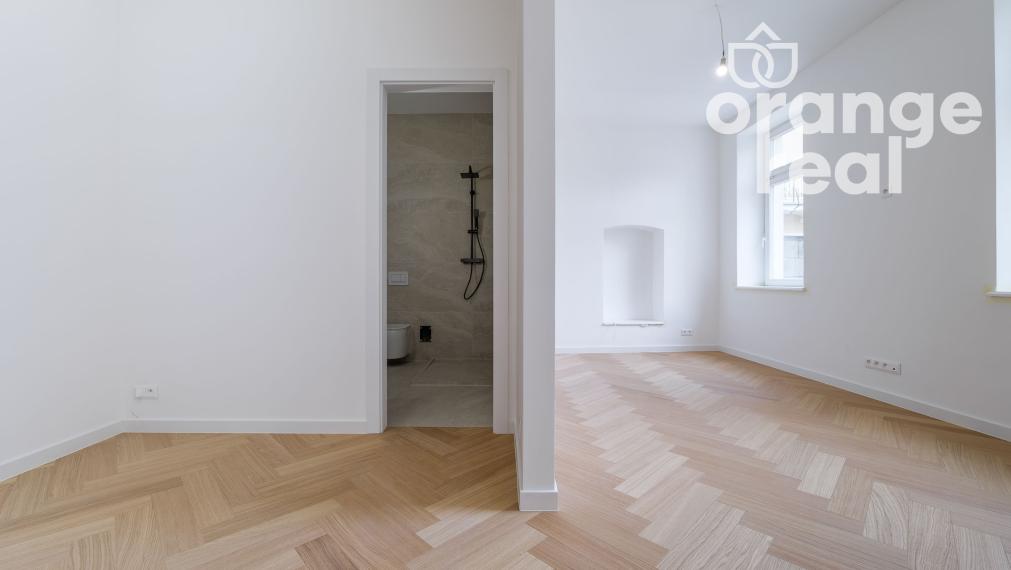 Priestranný 2-izbový byt v historickej budove na Moyzesovej ulici